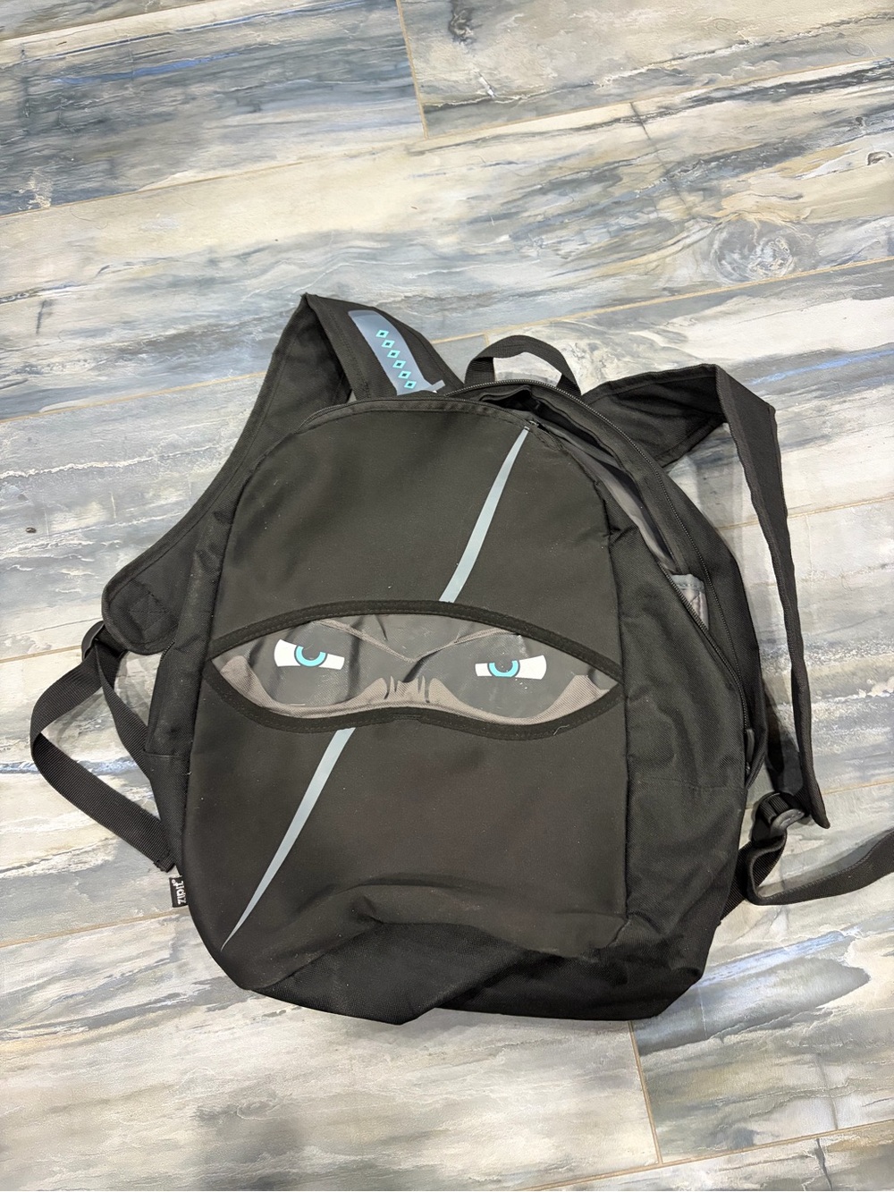 Black Novelty Ninja Eyes Backpack - Kid’s Bag- Zip-It